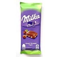 Шоколад MILKA Цілий Лісовий Горіх 90г.
